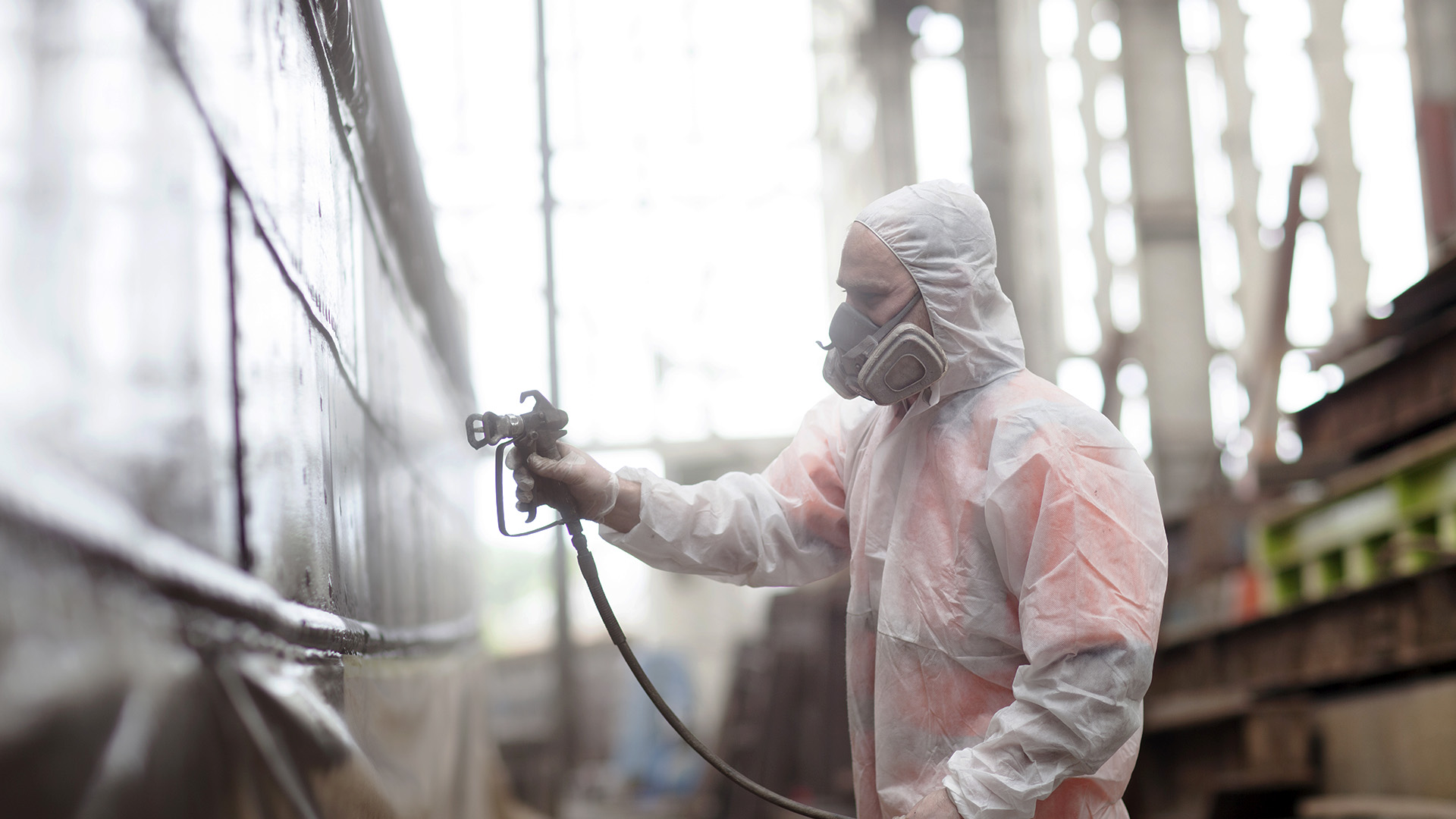 worker spray painting